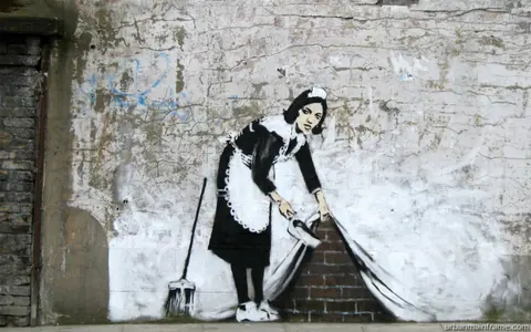 Banksy sweep it under the carpet